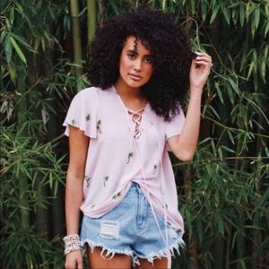 Buddy love pink palm trees lace up top